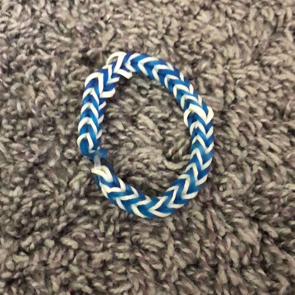 White and blue rubber band bracelet